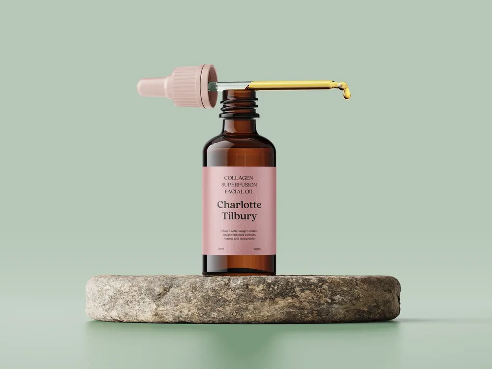 Mockup de cuentagotas con líquido similar al maquillaje